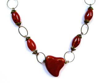 Glazed Red Clay Beads On An Oval/Round Antique Brass Chain With A Red Heart Pendant