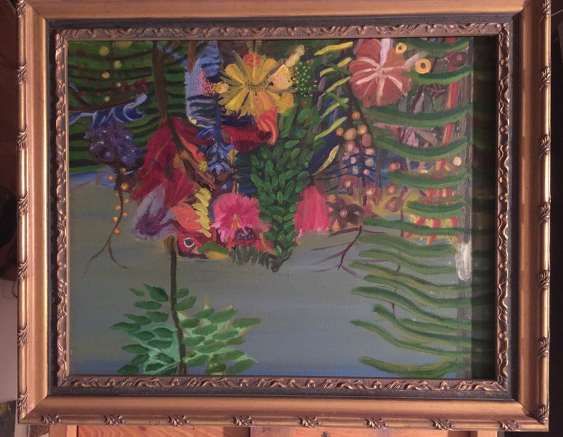 May include: A framed painting depicting a lush, tropical scene with vibrant flowers in shades of red, pink, and yellow. The flowers are surrounded by green foliage and a blue sky in the background.