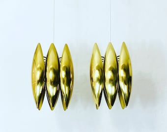 A pair of KASTOR brass pendant lights designed by Jo Hammerborg | 1960s