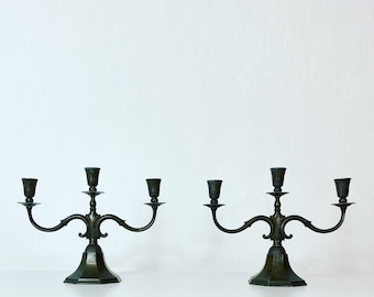 A pair of 1920s candelabrums designed by Just Andersen