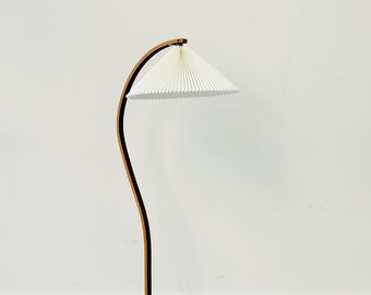 A dark wood Caprani floor lamp | 1970s | Denmark
