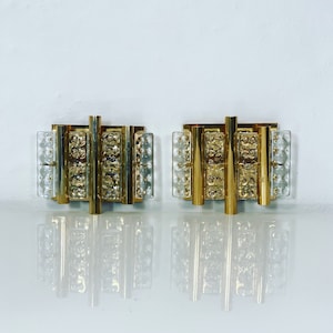 A pair of Swedish brass and glass sconces | 1960s