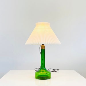 A light green Le Klint no. 302 glass table lamp designed by Gunnar Biilman Petersen | 1940s | Denmark