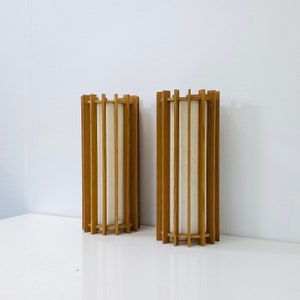 A pair of pine wood wall lamps by Ib Fabiansen for Fog & Mørup | Denmark | 1960s