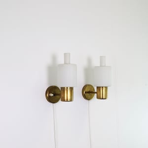 A set of NORDLYS brass sconces by Jo Hammerborg for Fog & Mørup | 1960s | Denmark