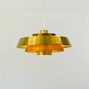 A classic Nova brass pendant light designed by Jo Hammerborg | 1960s