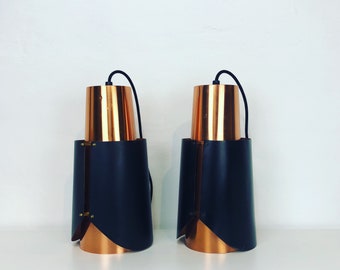 A pair of rare Bent Karlby - Østerport - pendant lights in black and copper