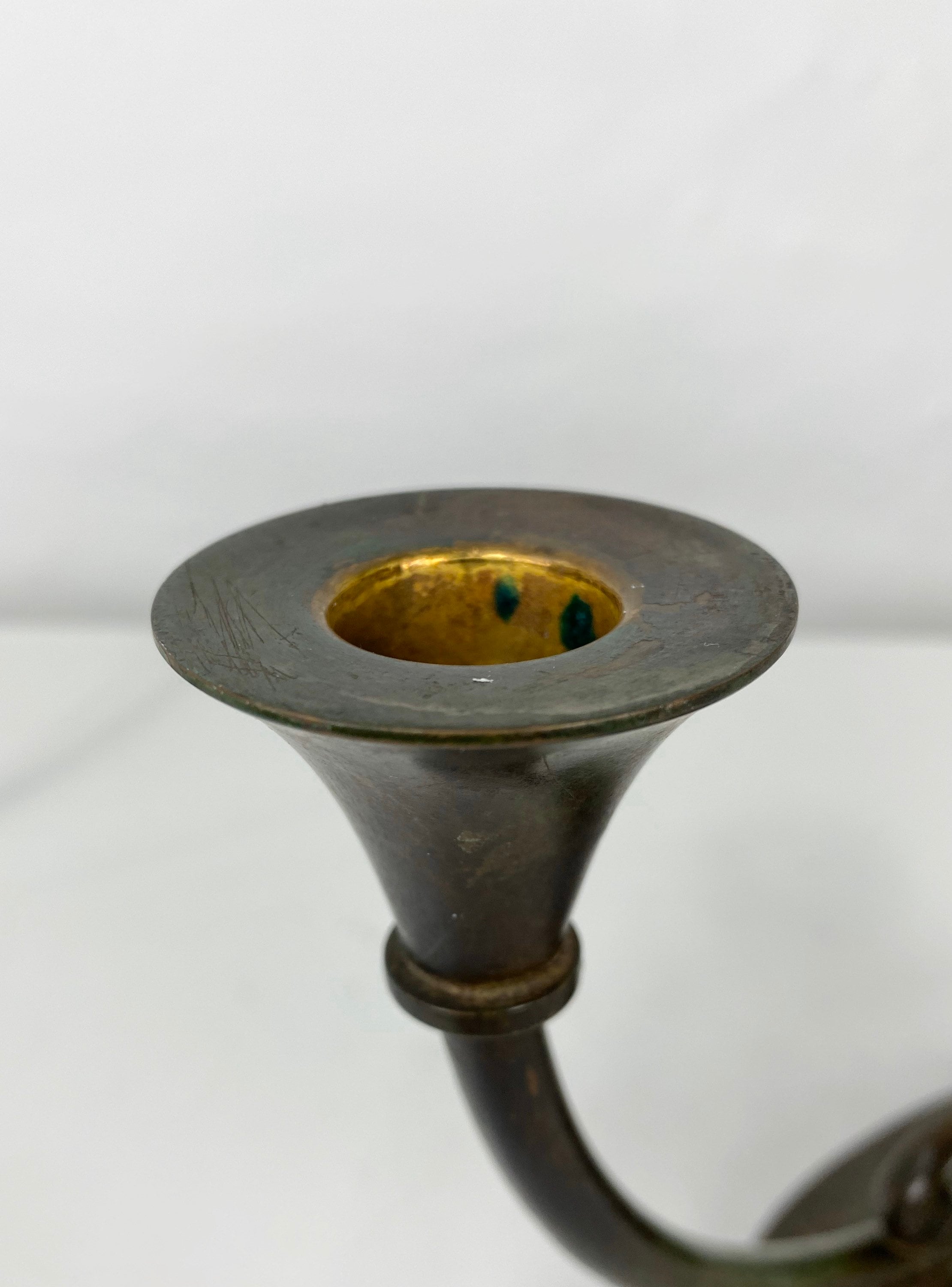 A rare pair of bronze candlestick holders designed by Just Etsy