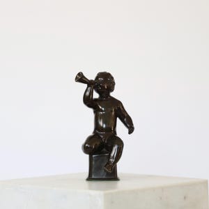 Diskometal sculpture of ‘Boy with horn’ designed by Just Andersen | 1930s | Denmark