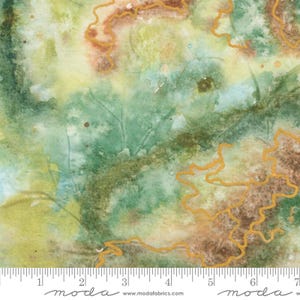 May include: Abstract watercolor fabric with a green, brown, and yellow color scheme. The fabric features a swirling, organic pattern with gold accents.