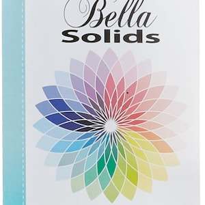 May include: A white book cover with the title "Bella Solids" in black text. The book cover features a colourful circular design with a rainbow colour scheme. The text "2019 Color Your World." is printed in black at the bottom of the cover.
