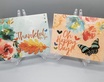 Juego de tarjetas de felicitación en tonos melocotón y azul