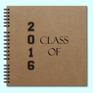 May include: A brown spiral bound notebook with the text "Class of 2016" printed on the front cover.
