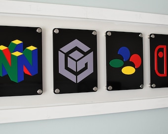 Placa acrílica con el logotipo de una consola de juegos: decoración retro para salas de juegos