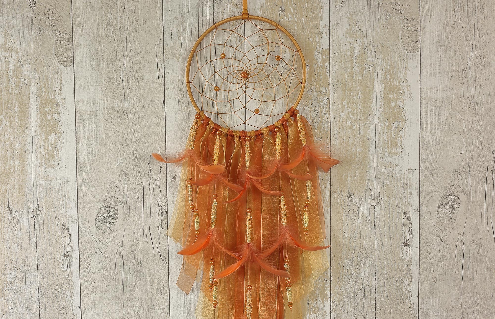 Handmade Gold Dreamcatcher: Boho Wall Hanging with Copper Feathers