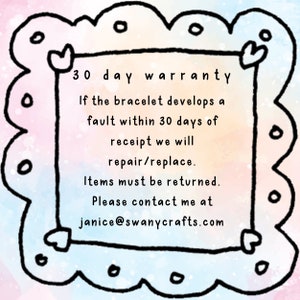 May include: A whimsical frame with a scalloped border and heart details. Inside, text outlines a 30-day warranty for bracelets, covering faults with repair or replacement, and contact details.