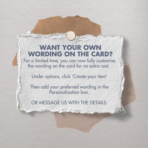 May include: A white, torn paper with the text "WANT YOUR OWN WORDING ON THE CARD?" and instructions for customisation. It's pinned to a brown paper with a gold tack. The background is a light grey.