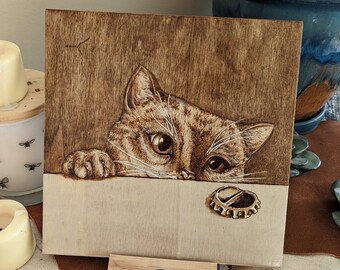 Cat vs Bottle Cap, Pyrography on Wooden Canvas, Hanging Ready, Light Glossy Seal