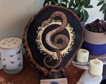 Silver Tongued Snake, Pyrography / Gold Ink on Raw Basswood Slice, Glossy Seal