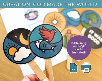 May include: Educational set featuring circular illustrations on wooden sticks depicting elements of creation. The set includes images of the sun, moon, fish, bird, and the phrase "IT WAS GOOD." The text "CREATION: GOD MADE THE WORLD" is at the top.
