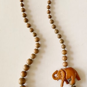 Vintage Olive Brown Wood Bead Elephant Necklace