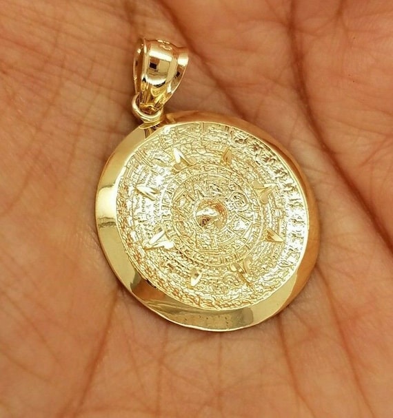 Gold aztec hotsell pendant