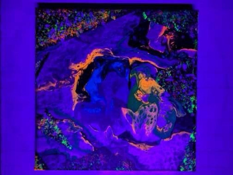 May include: Abstract painting with swirling patterns in shades of purple, blue, orange, and green. The painting has a vibrant, almost neon-like quality.