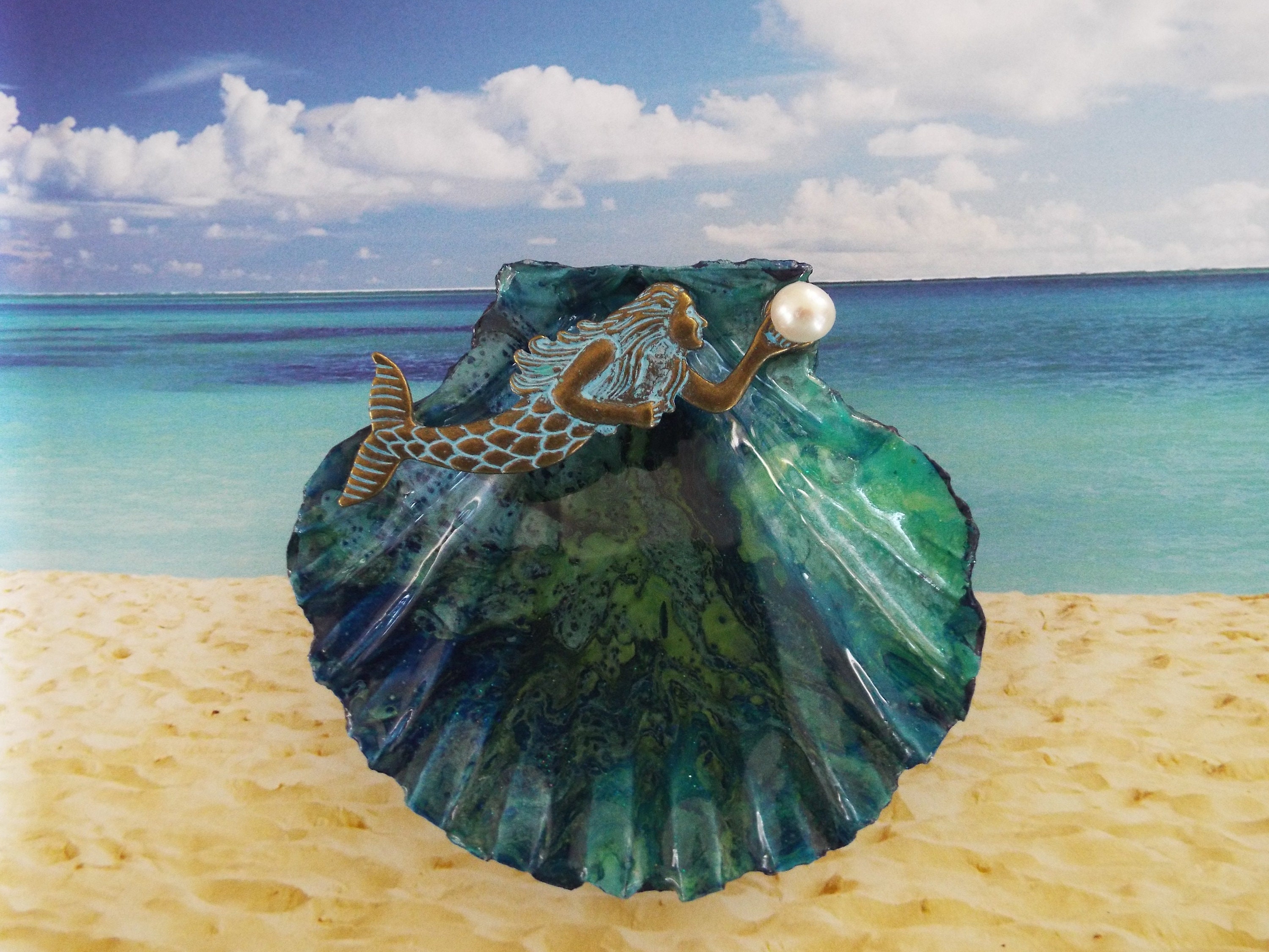 Images of animated mermaids and pearls Images of animated mermaids and pearls