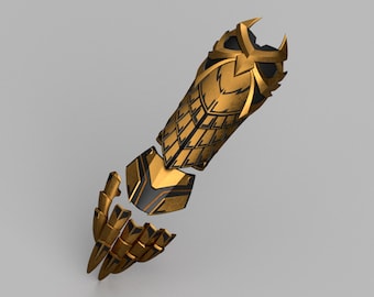 Puede incluir: Un protector de brazo segmentado dorado y negro con un diseño de búho. El protector de brazo está hecho de varias piezas, con detalles intrincados y un acabado metálico. El diseño presenta ángulos agudos y patrones geométricos.