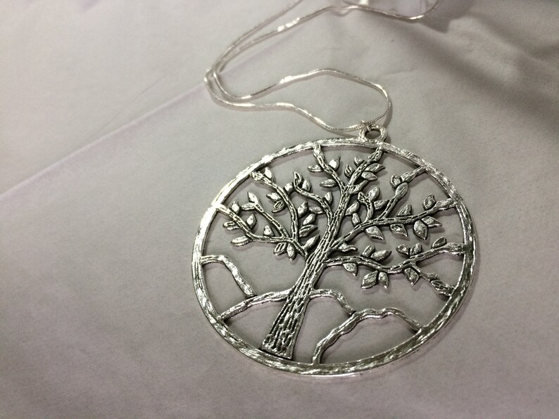 Large Tree of Life Pendant and Earrings Setor Separately.