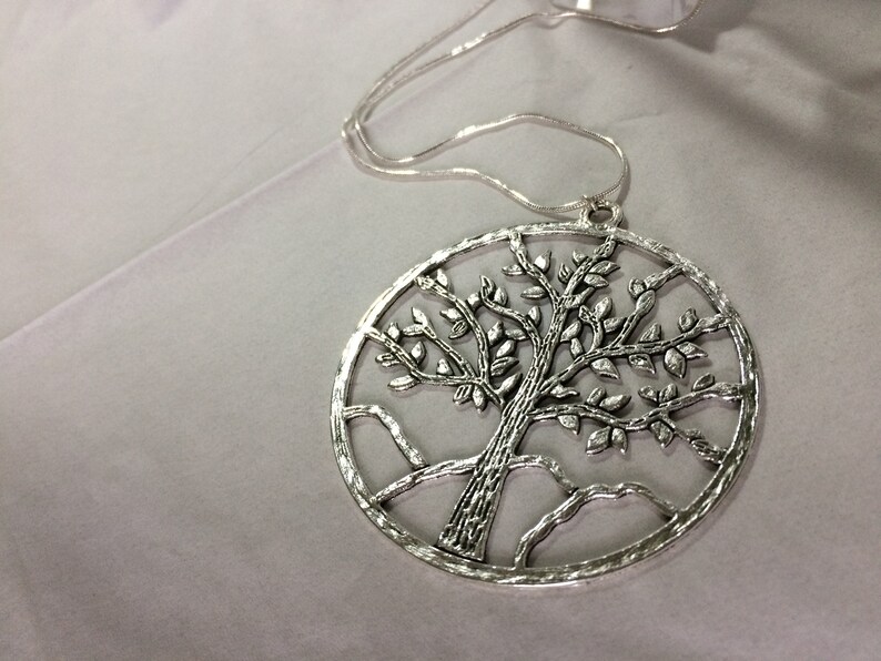 Large Tree of Life Pendant and Earrings Setor Separately.