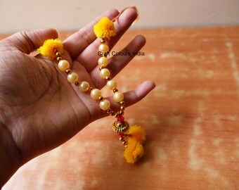 Small beaded God mala, yellow pompom white beads small photo garland