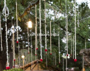 White tuberose garlands with red rose for wedding decorations