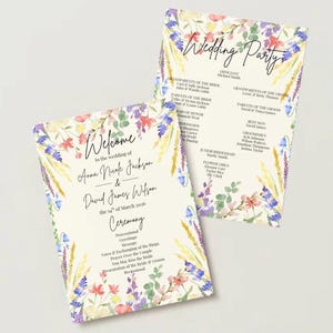 May include: Two wedding programme cards featuring a cream background with watercolour floral borders in shades of pink, purple, blue, and green. The text includes "Welcome to the wedding of Anna Nicole Jackson & David James Wilson" and "Wedding Party".