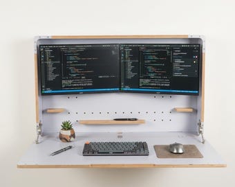 Murphy-bureau met twee monitoren: ruimtebesparend muurwerkstation voor thuiskantoor