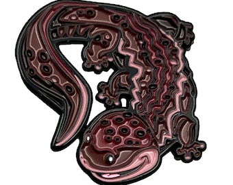 May include: A dark red and pink enamel pin of a salamander with a detailed, textured design. The salamander is curled up with its tail wrapped around its body.