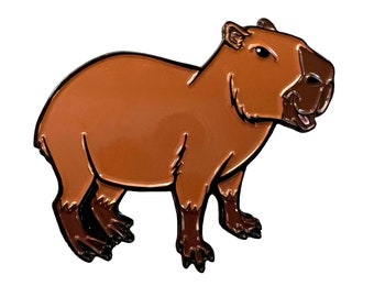 May include: A brown capybara enamel pin with a cartoon-like design. The capybara is standing on all fours with its mouth open.