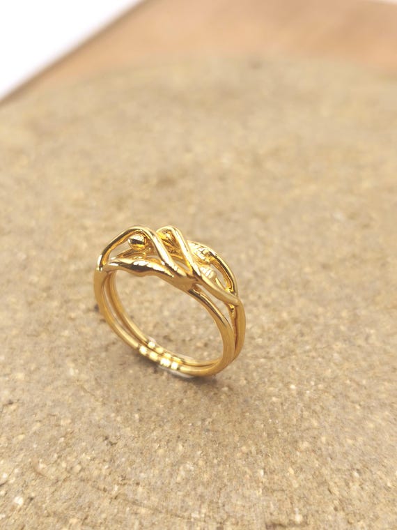 Couples ring gold . Puzzle ring gold interlocking ring