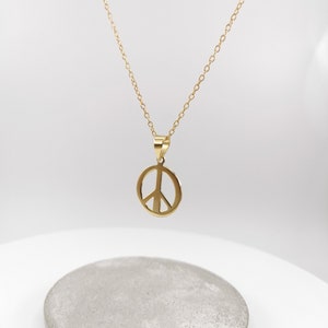 Gold peace pendant