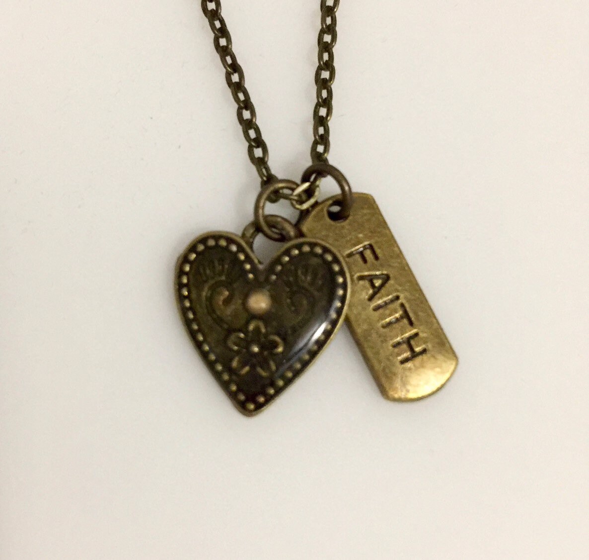 Faith of a mustard seed charm necklace with heart in antique bronze