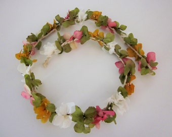 Small crown with green, pink, yellow and white hydrangea