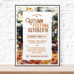 May include: A poster advertising an Autumn Festival on October 16th. The poster features a white background with brown text and a blurred image of autumn leaves in the background. The text reads "Autumn Festival October 16, Saturday from 12-4, Centennial Park Pavilion, 250 Park Ave NW, Atlanta, GA 30313, 120+ Craft and Vintage Vendors, Local Food Vendors, Bounce House, Family Friendly, Swag Bag for the First 250 Attendees, $5, rotassociation.com/tickets".