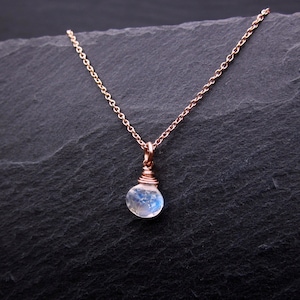 High Quality Rainbow Moonstone Gemstone Necklace against contrasting background