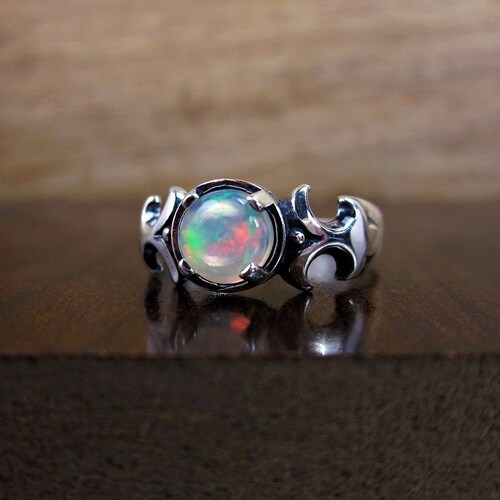 Ethiopian Opal Sterling Silver Ring: Carved Celtic Band