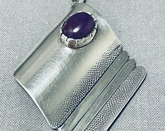 Noteworthy Leo Nez Vintage Native American Navajo Sugulite Sterling Silver Necklace Noteworthy Leo Nez Vintage Native American Navajo Sugulite Sterling Silver Necklace