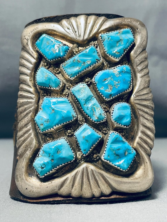 Impressive Vintage Native American Zuni Handcarved 11 Turquoise Black Leather Bowguard Impressive Vintage Native American Zuni Handcarved 11 Turquoise Black Leather Bowguard