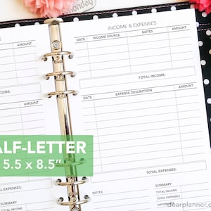May include: A black and white polka dot binder with a white page open to a budget tracker. The page is labeled "Income & Expenses" and has columns for date, income source, notes, and amount. The page also has a section for expense description and amount. The binder is 5.5 inches by 8.5 inches.