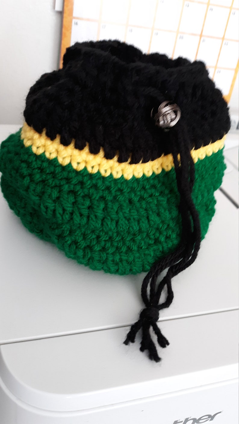 6 inches wide Rasta Pouch 2-7 inches deep pouch can be used for jewelry, coins, candy, gift