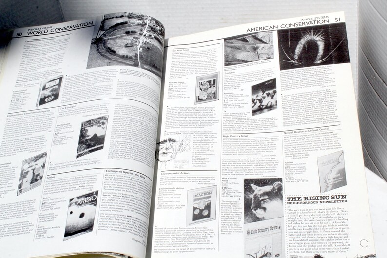 K&ouml;nnte beinhalten: Offene Buchseiten mit Text und Schwarz-Wei&szlig;-Bildern. Die linke Seite tr&auml;gt den Titel "WORLD CONSERVATION" und die rechte Seite den Titel "AMERICAN CONSERVATION". Zu den Bildern geh&ouml;ren Luftaufnahmen, Illustrationen und Zeitschriften-Cover.