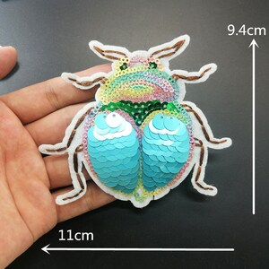 Parche de lentejuelas con diseño de escarabajo o libélula, ideal para abrigos, camisetas y disfraces.